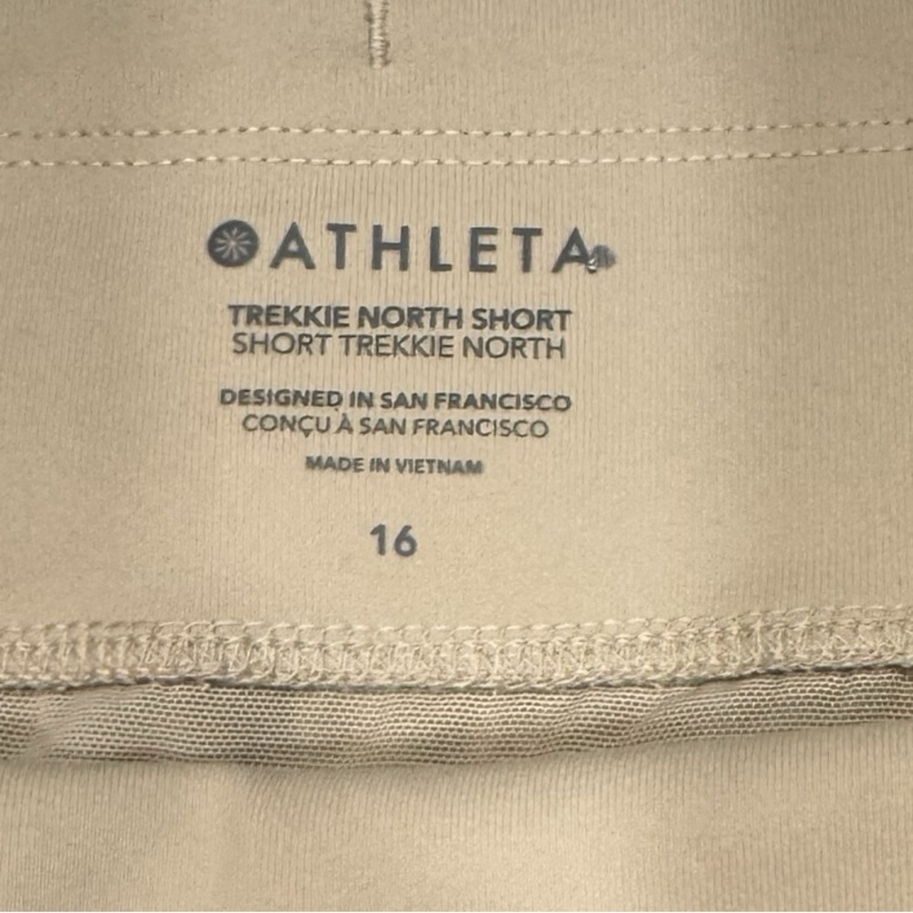 ATHLETA Trekkie North Short UPF Secure Pockets Tan Neutral NWT 16 - Picture 5 of 13